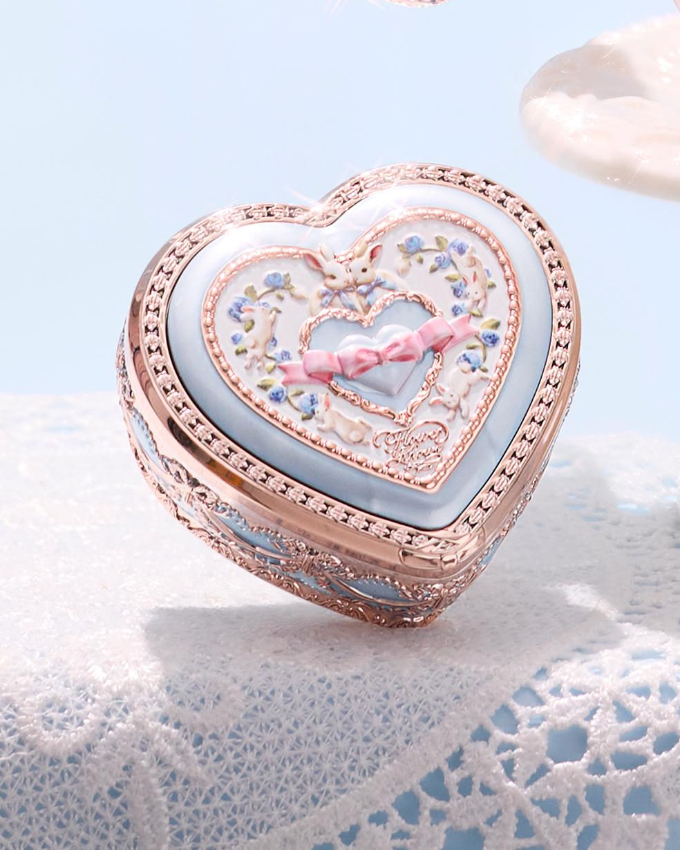 Bunny Garden Embossed Blush with blue compact 