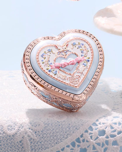 Bunny Garden Embossed Blush with blue compact 